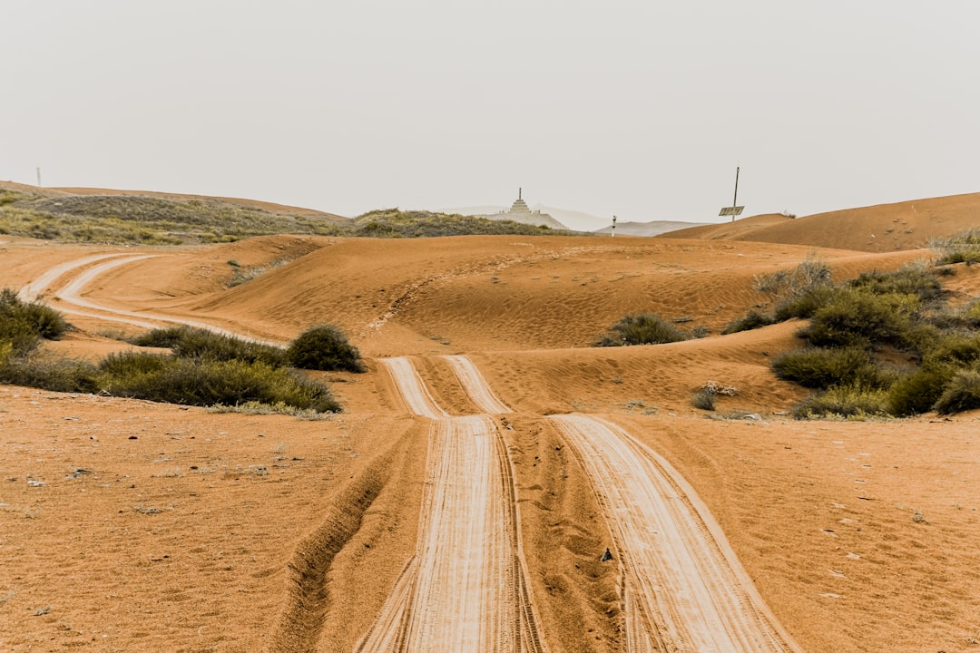 Arid desert landscape illustrating the sparse population of western China